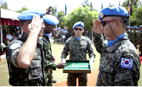 Commander of the engineering battalion of the Danbi Unit in Haiti Lt. Col. Jeong Gu-ho, right, salutes Maj. Gen. Fernando Rodriguez Goulart, Force Commander of the United Nations Stabilization Mission in Haiti during a United Nations Medal presentation ceremony. Provided by the unit Commander of the engineering battalion of the Danbi Unit in Haiti Lt. Col. Jeong Gu-ho, right, salutes Maj. Gen. Fernando Rodriguez Goulart, Force Commander of the United Nations Stabilization Mission in Haiti during a United Nations Medal presentation ceremony. Provided by the unit